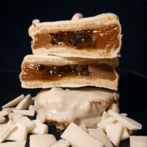 alfajor dulce de leche y maracuyá blanco